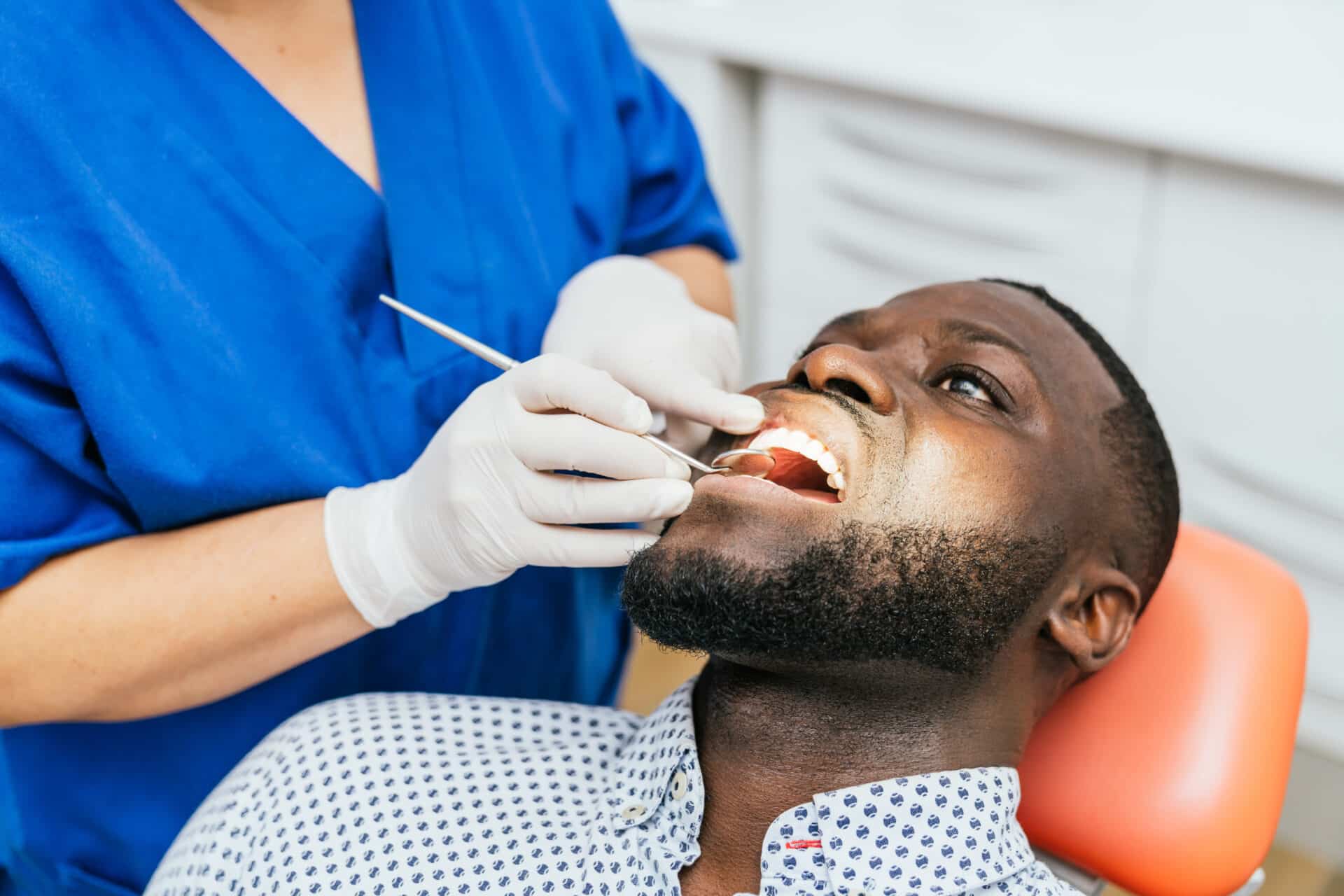 black man oral cancer brush biopsy